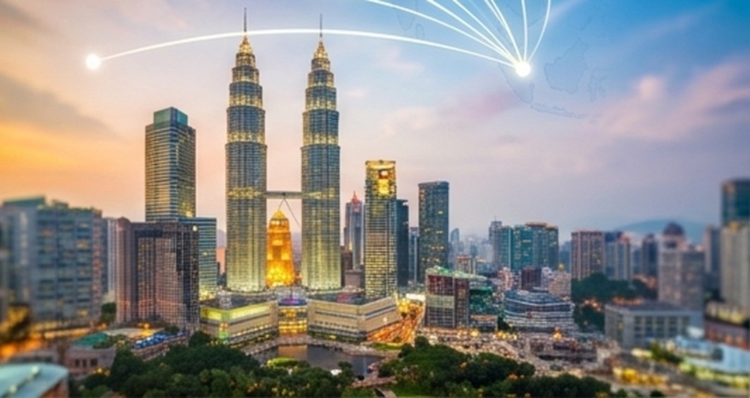 Kuala Lumpur city skyline with the Petronas Towers at dusk